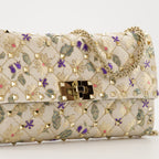 Sacs à main et épaule Pochette Rockstud Spike Valentino Garavani Multicolore Femme