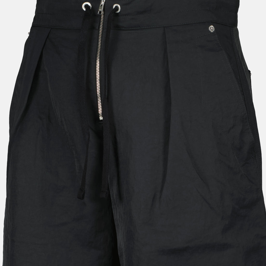 Image of the Ami PARIS brand zippered pants for men - Fall-Winter 2025 - Detailed view_1