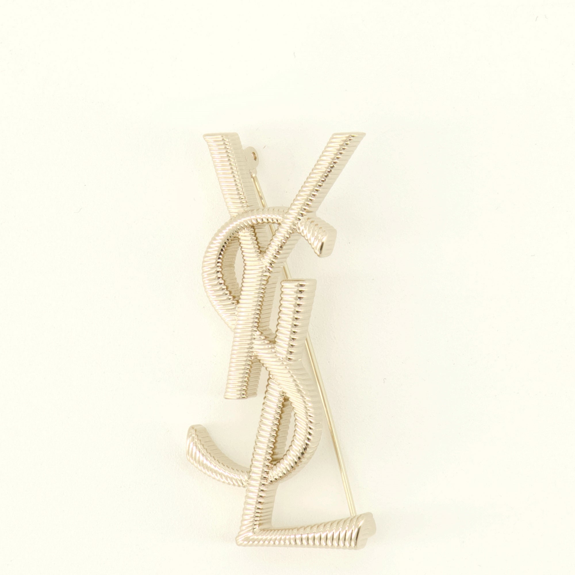 Bijoux Broche Cassandre en métal doré Saint Laurent Doré Unisexe