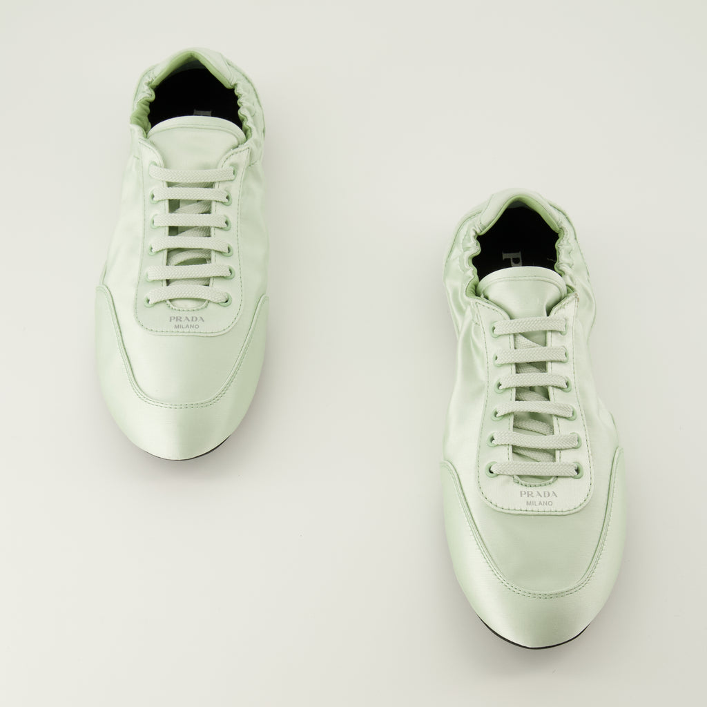Image de l'article Baskets Collapse en soie vert d'eau de la marque Prada pour Femme - Saison Printemps-Été 2026 - Vue de dessus paire de chaussure