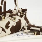 Immagine della borsa mini Bonnie con stampa a mucca del marchio Prada per donna - Stagione Primavera-Estate 2026 - Vista Dettagliata_2