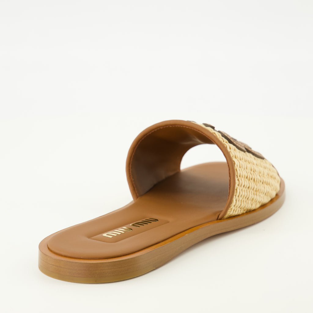 Image of the brown leather and raffia slipper from the Miu Miu brand for Women - Spring-Summer 2026 Season - Back view