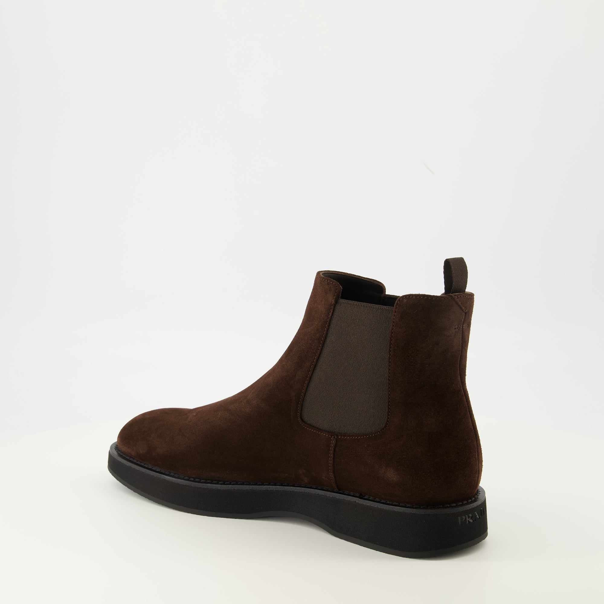 Image of the Prada men's calf suede ankle boots - Fall-Winter 2025 season - Three-quarter back right view