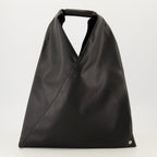 Imagem da bolsa japonesa preta da marca Mm6 para Mulheres - Temporada Primavera-Verão 2026 - Vista Frontal