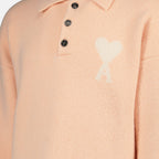 Bild des hellrosa Herz-Polos der Marke Ami PARIS für Unisex - Herbst-Winter 2025 - Rückansicht