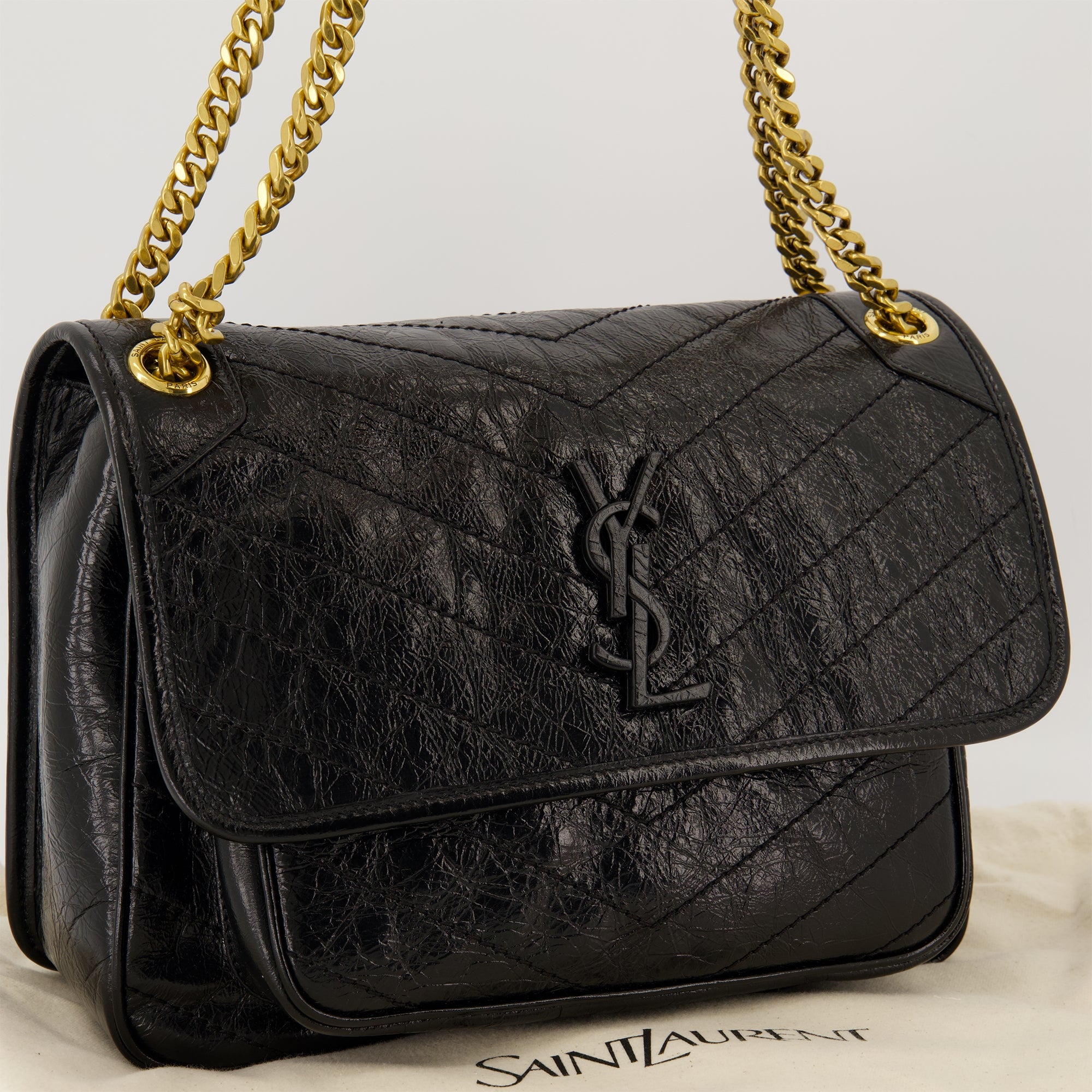 Image of the Saint Laurent brand Niki medium vintage leather bag for Women - Autumn-Winter 2025 Season - Detailed View_2