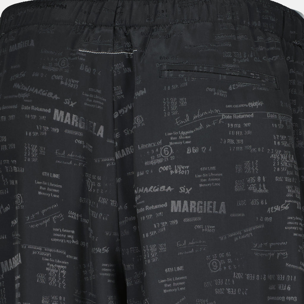 Image de l'article Pantalon ample imprimé gris de la marque Mm6 pour Femme - Saison Printemps-Été 2026 - Vue détaillée_1