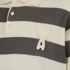 Immagine del polo in maglia di cotone bianco e marrone del marchio Ami PARIS per Uomo - Stagione Primavera-Estate 2026 - Vista Dettagliata_1