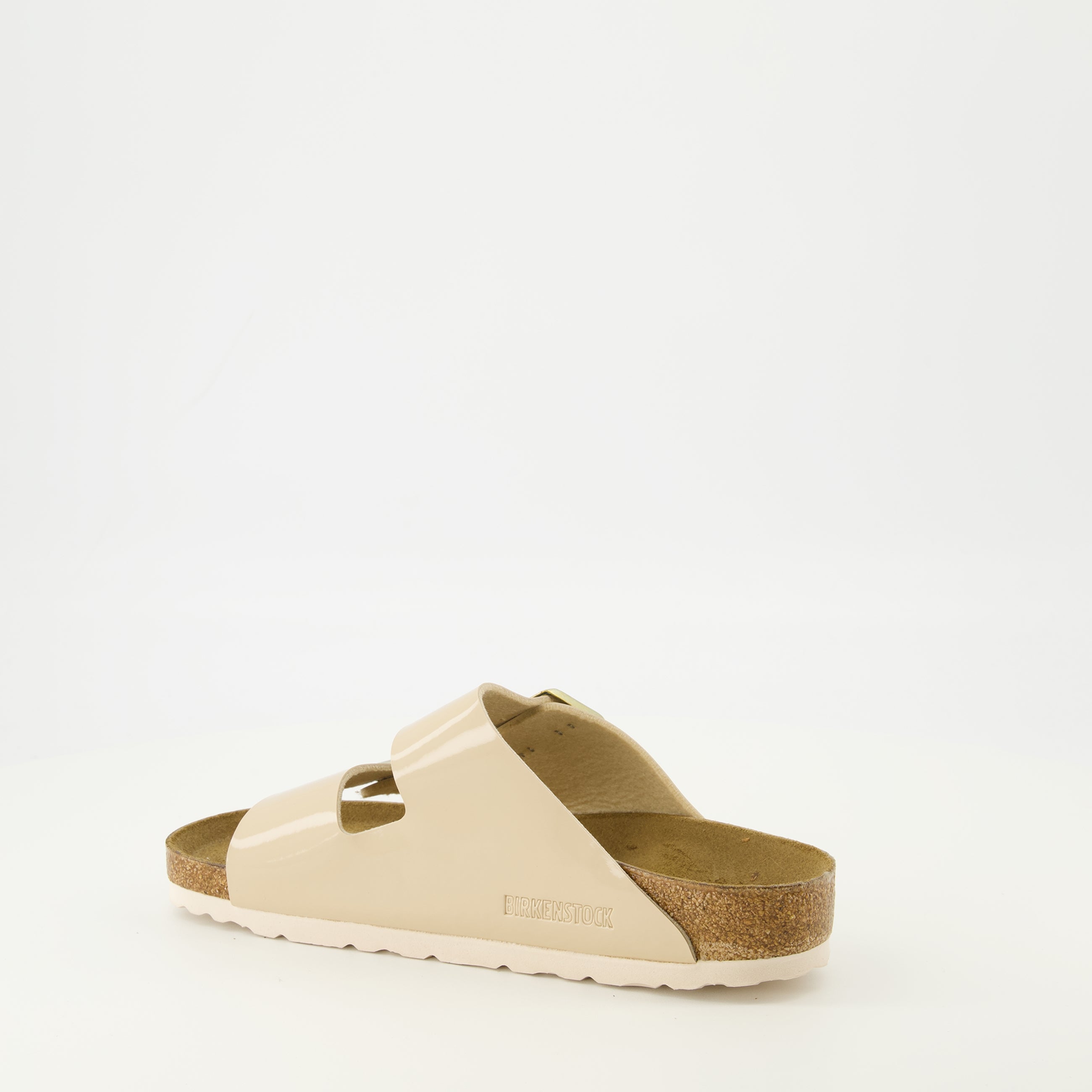 Image de l'article Sandales Arizona beige de la marque Birkenstock pour Unisex - Saison Printemps-Été 2026 - Vue trois quarts arrière droite