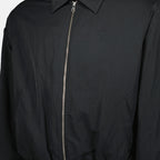 Image of the AMI grey heart zip-up jacket by Ami PARIS for Men - Fall-Winter 2025 - Detailed View_1