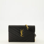 Sacs à main et épaule Portafoglio Cassandre con Catena in Pelle Graine Nera Saint Laurent Noir Femme