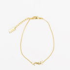 Image de l'article Bracelet Cassandre doré de la marque Saint Laurent pour Homme - Saison Printemps-Été 2022 - Vue de Dos