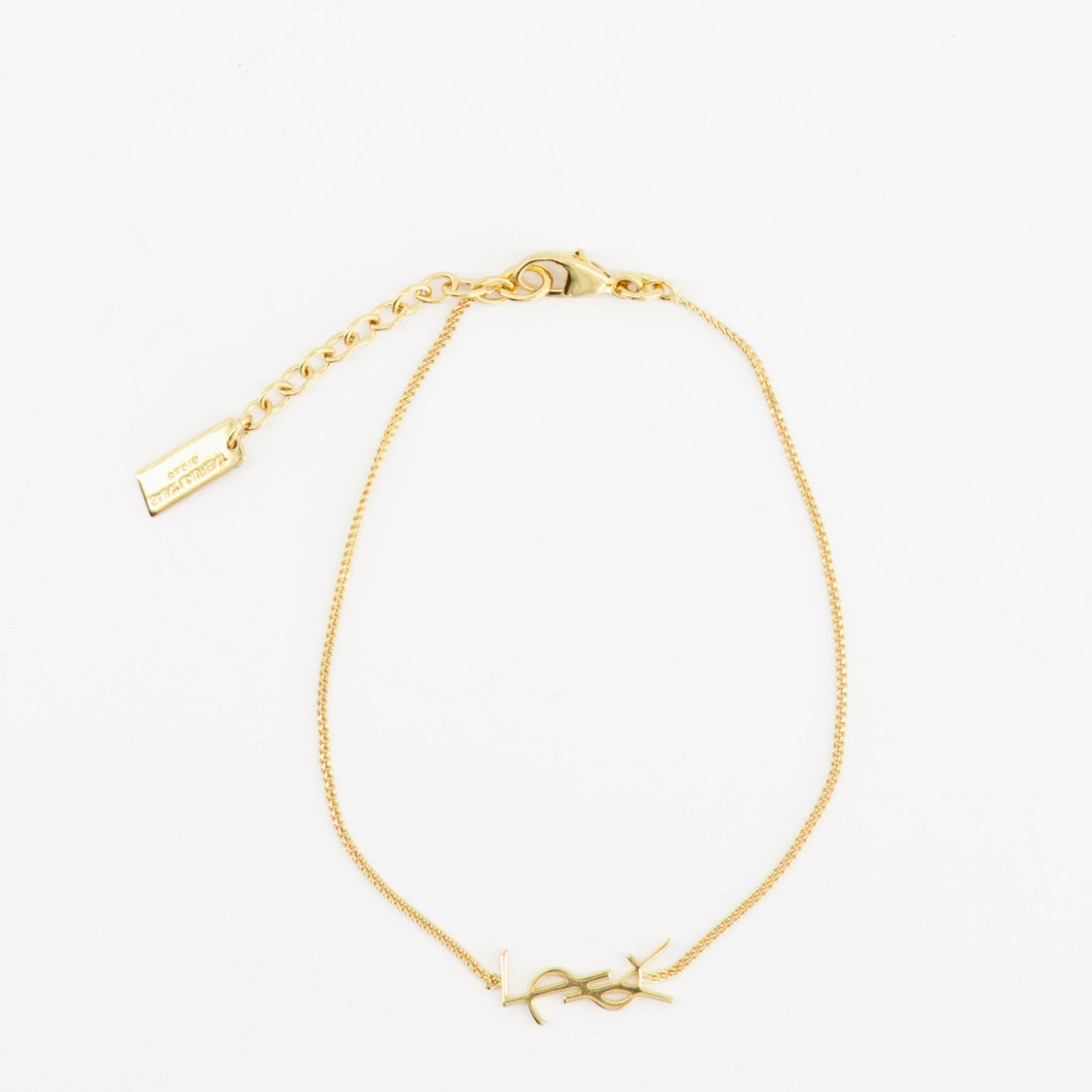 Image de l'article Bracelet Cassandre doré de la marque Saint Laurent pour Homme - Saison Printemps-Été 2022 - Vue de Dos