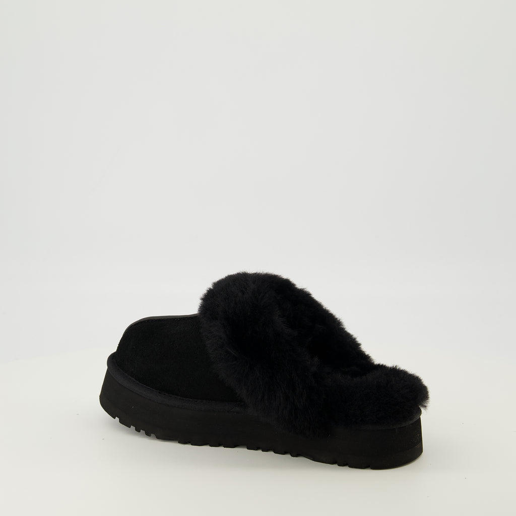 Image of the Ugg women's Black Disquette Mules article - Spring-Summer 2026 season - Three-quarters back right view