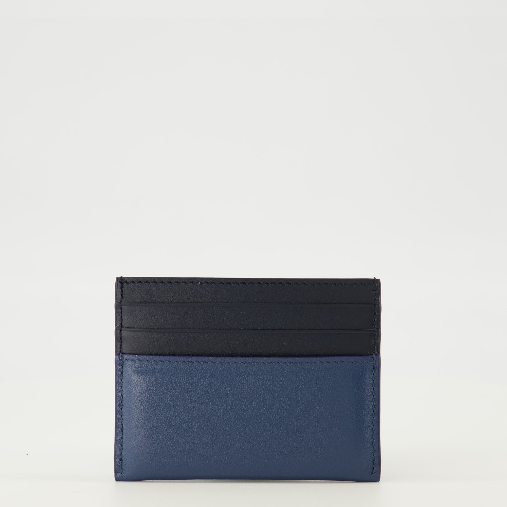 Image of the Antigona Stamped navy blue card holder from the Givenchy brand for Men - Spring-Summer 2026 - Back View