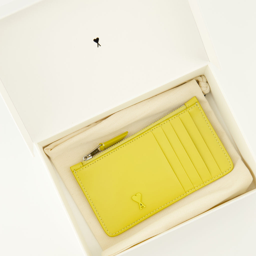 Image of the zippered card holder Ami de coeur yellow from the brand Ami PARIS for Unisex - Spring-Summer Season 2026 - Detailed View 3