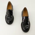Image de l'article Mocassins en cuir à talon de la marque Tod's pour Femme - Saison Automne-Hiver 2025 - Vue de dessus paire de chaussure