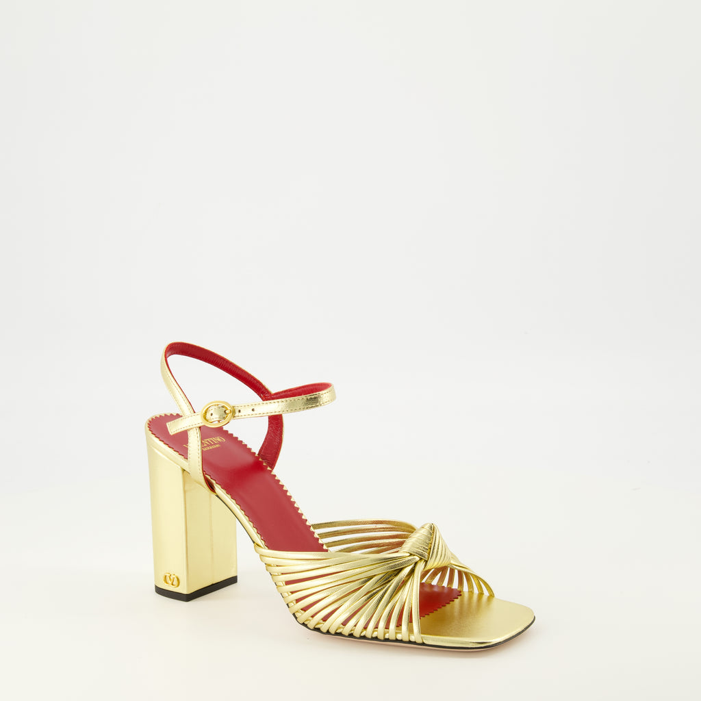 Image of the Annet heeled sandals in gold lamé by Valentino Garavani for Women - Spring-Summer 2026 - Three-quarter front right view