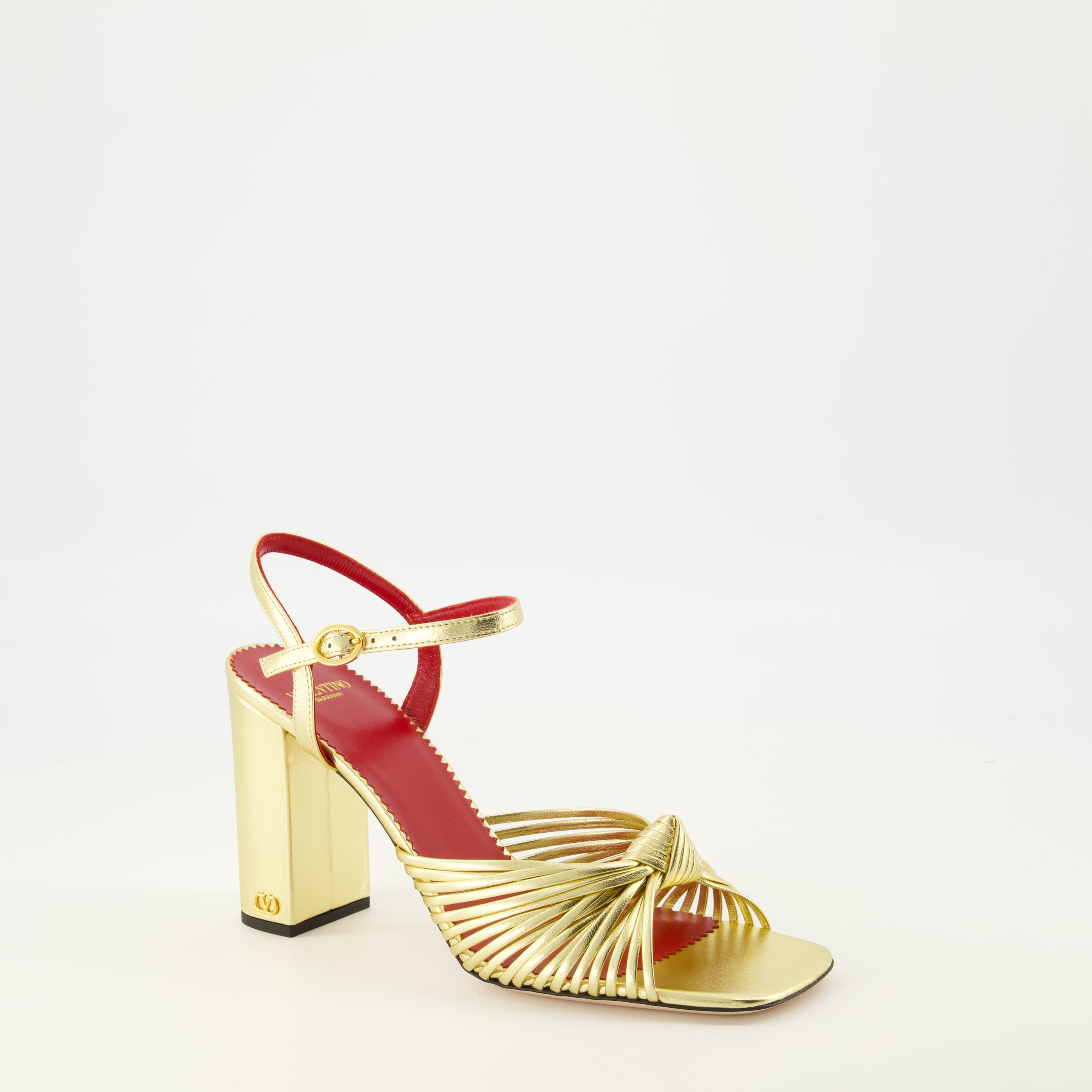 Image of the Annet heeled sandals in gold lamé by Valentino Garavani for Women - Spring-Summer 2026 - Three-quarter front right view