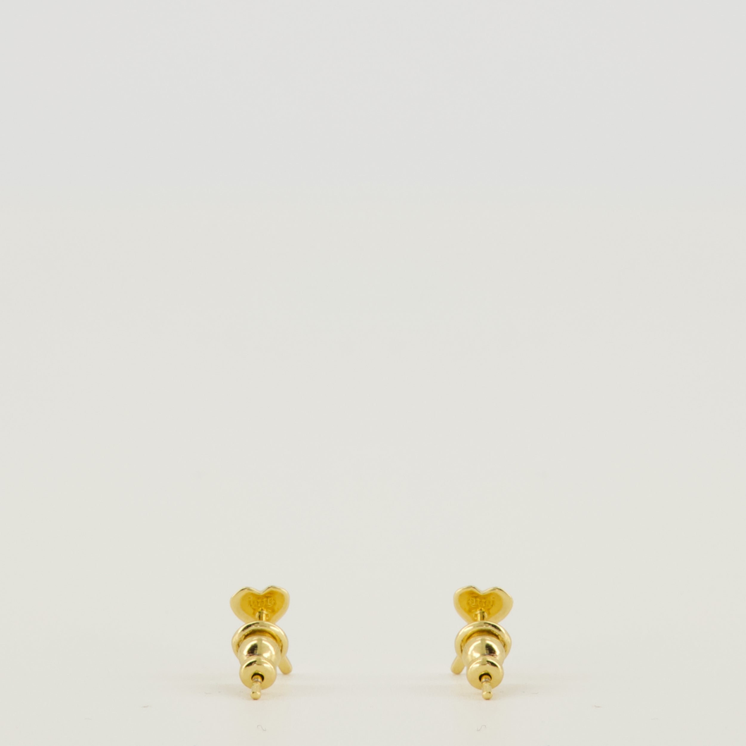 Image de l'article Boucles d'oreilles Ami de coeur doré de la marque Ami PARIS pour Femme - Saison Printemps-Été 2026 - Vue de Dos