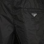 Immagine del costume da bagno in Re-Nylon blu marino da uomo di Prada - Collezione Primavera-Estate 2026 - Vista dettagliata_1