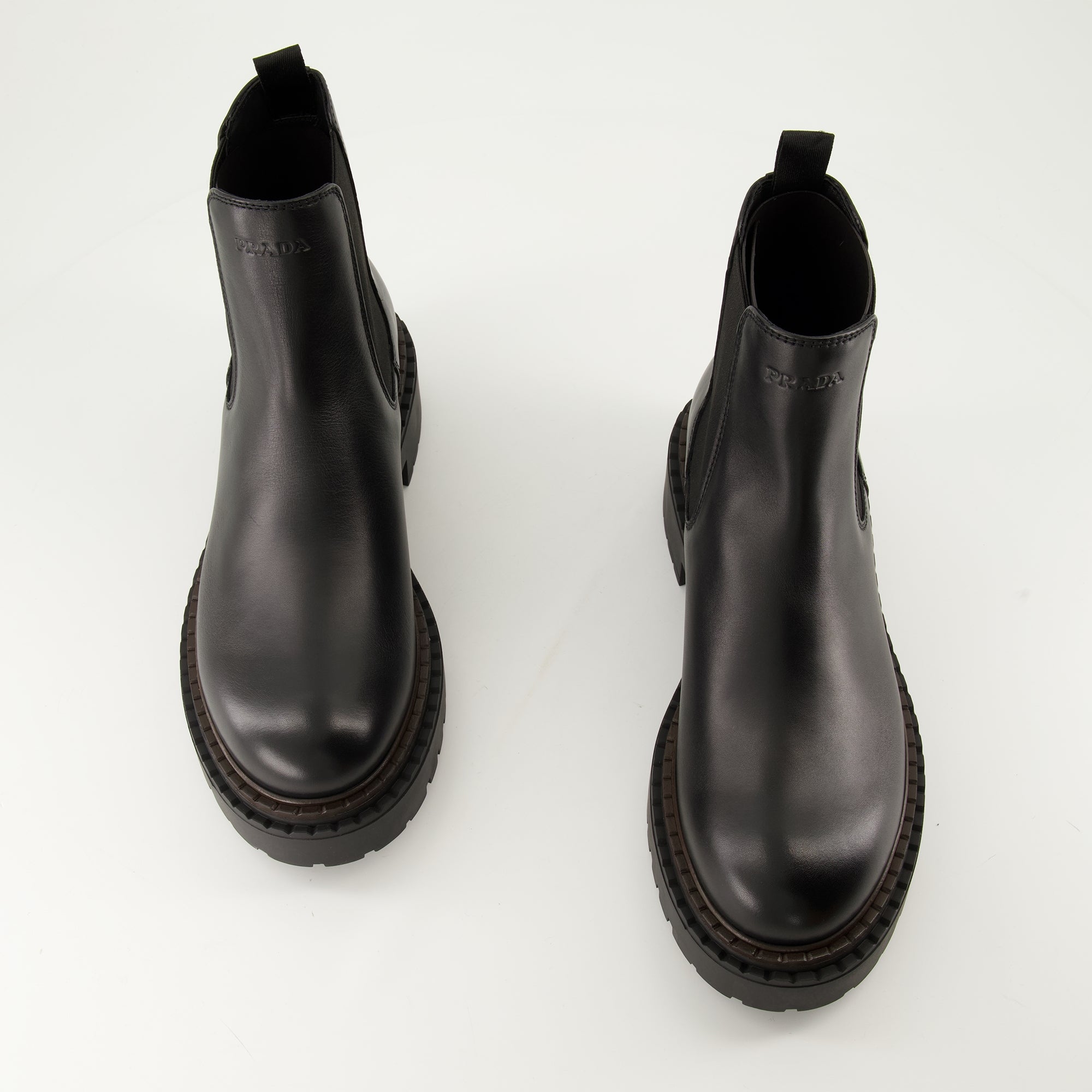 Boots and ankle boots Leather Ankle Boots Prada Black Homme