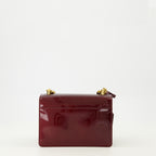 Imagem da bolsa Sunset em couro verniz bordô da marca Saint Laurent para Mulher - Temporada Outono-Inverno 2025 - Vista Traseira