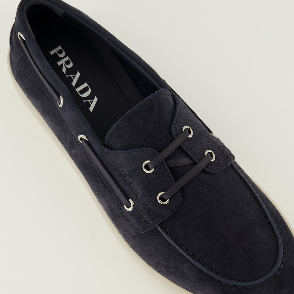 Image of the navy blue suede loafers from the Prada brand for men - Spring-Summer 2026 season - Detailed top view