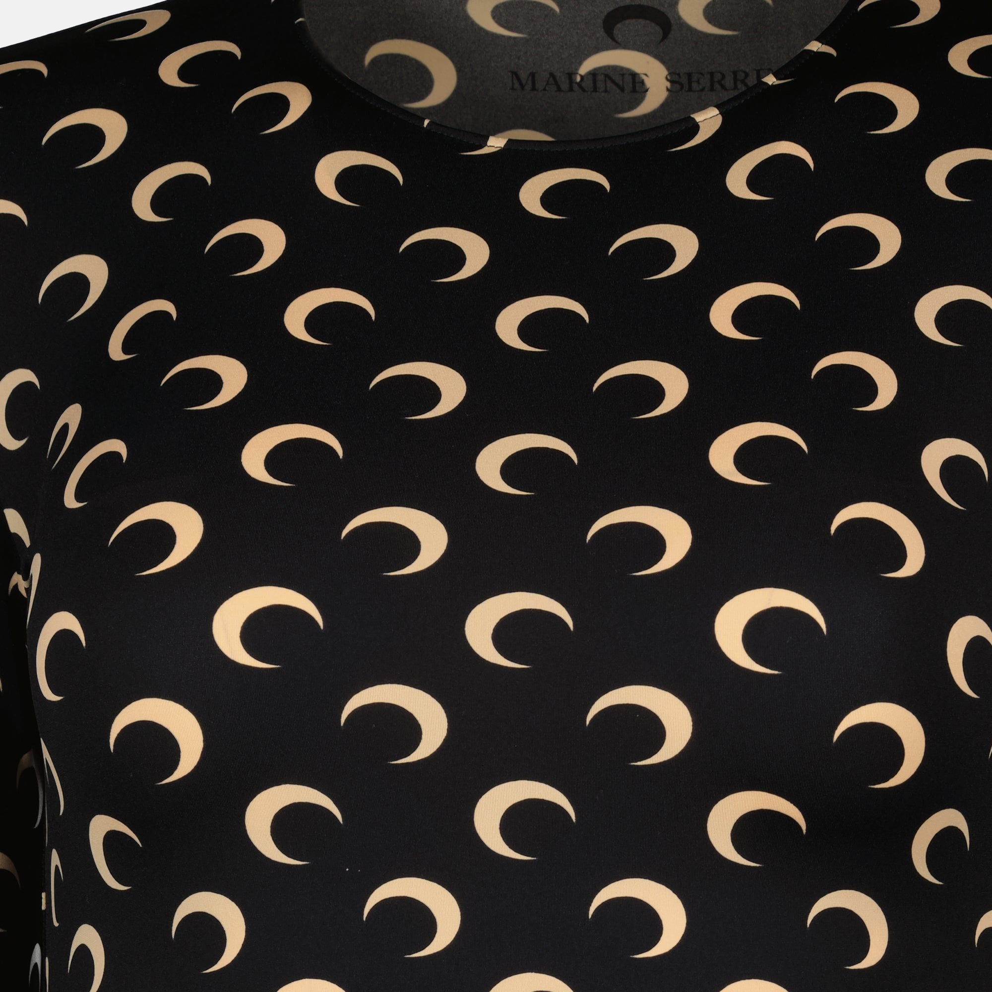 Image of the black and beige Jersey Moon Top by Marine Serre for Women - Fall-Winter 2025 - Detailed View_2