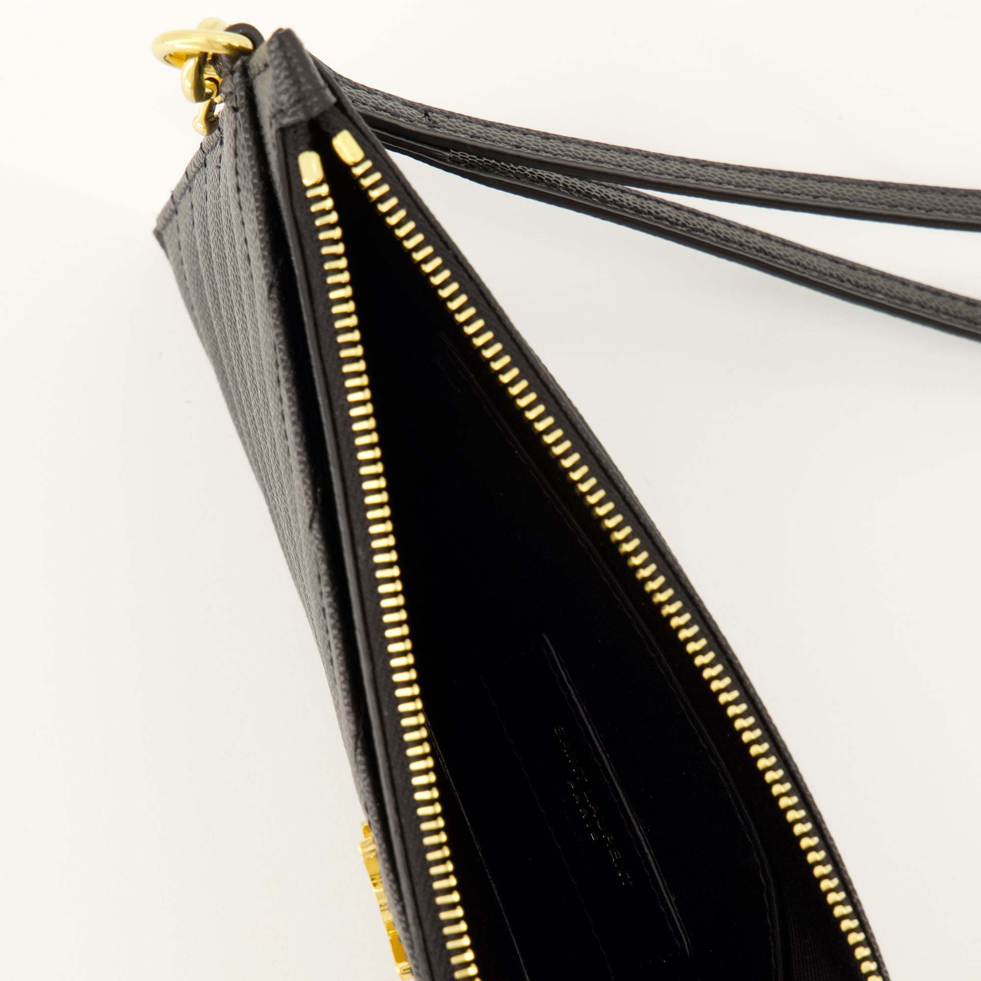 Pochettes Cassandre Leather Clutch in Black Saint Laurent Noir Femme