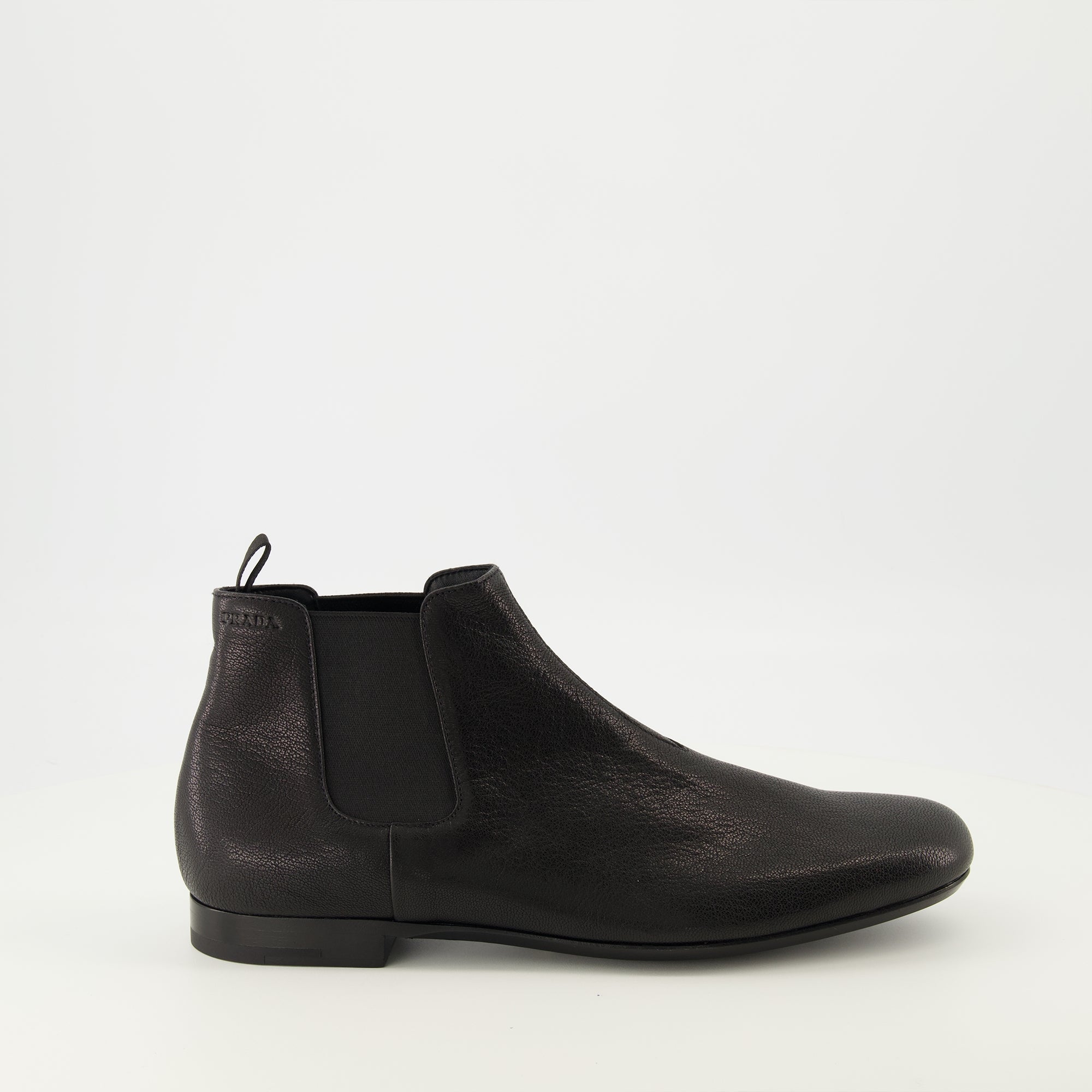Image of the black leather Chelsea boots by Prada for Men - Spring-Summer 2026 - Right side view