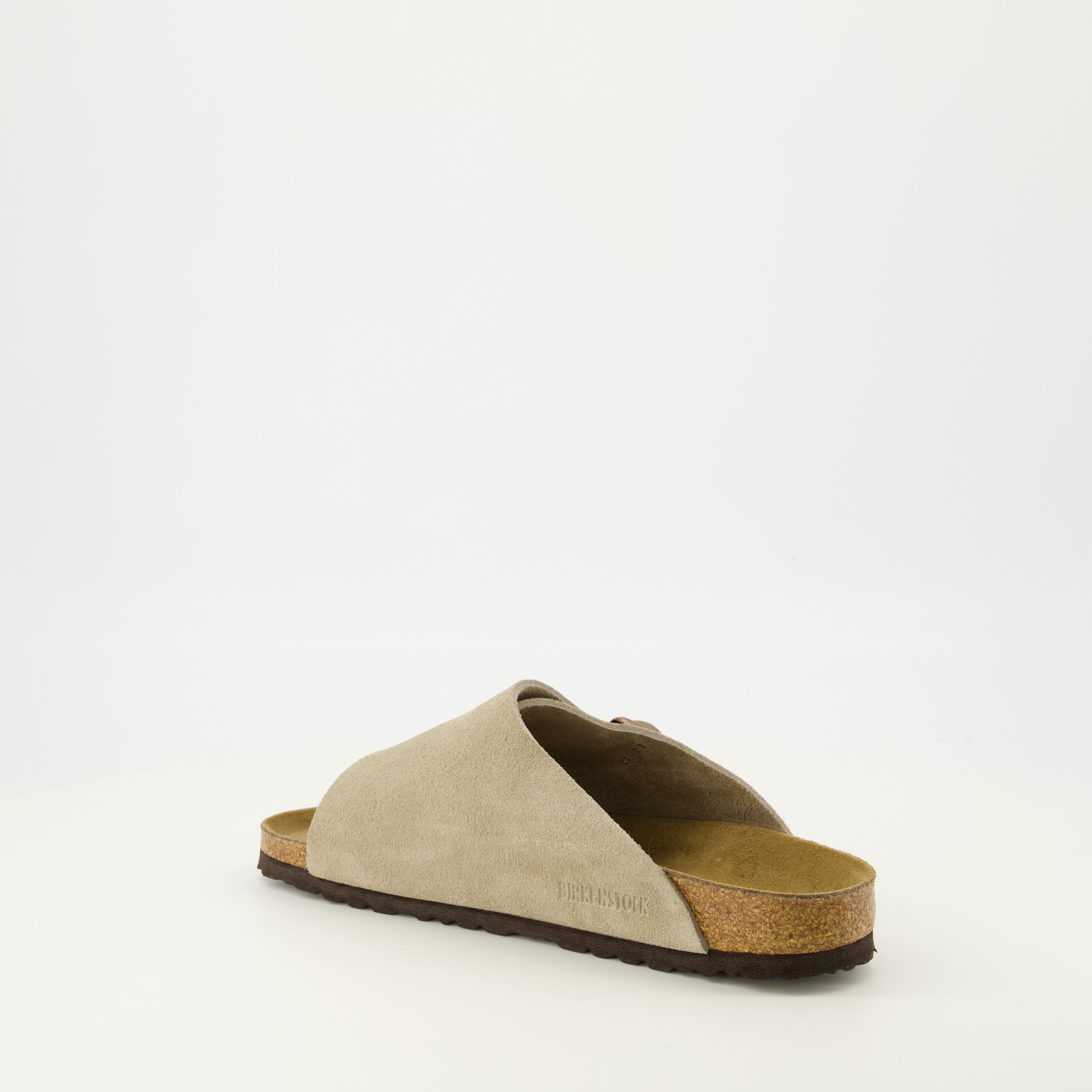 Immagine delle sandali Zürich in suede beige del marchio Birkenstock per Unisex - Stagione Primavera-Estate 2026 - Vista tre quarti posteriore destra