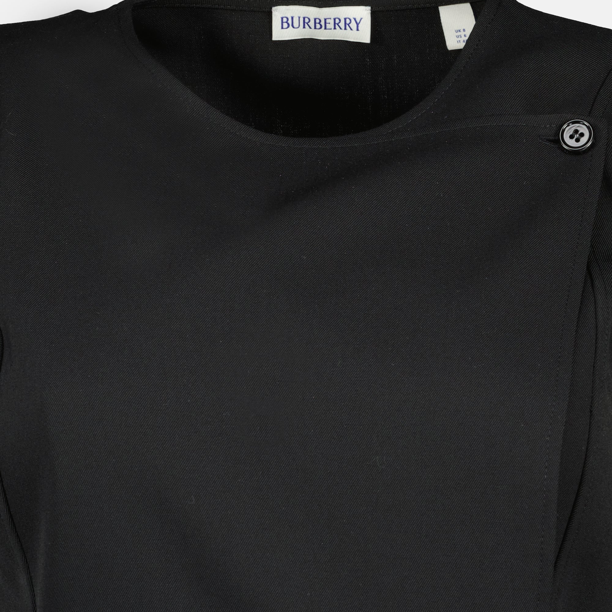 Image de l'article Robe kilt en laine noire de la marque Burberry pour Femme - Saison Automne-Hiver 2025 - Vue détaillée_1