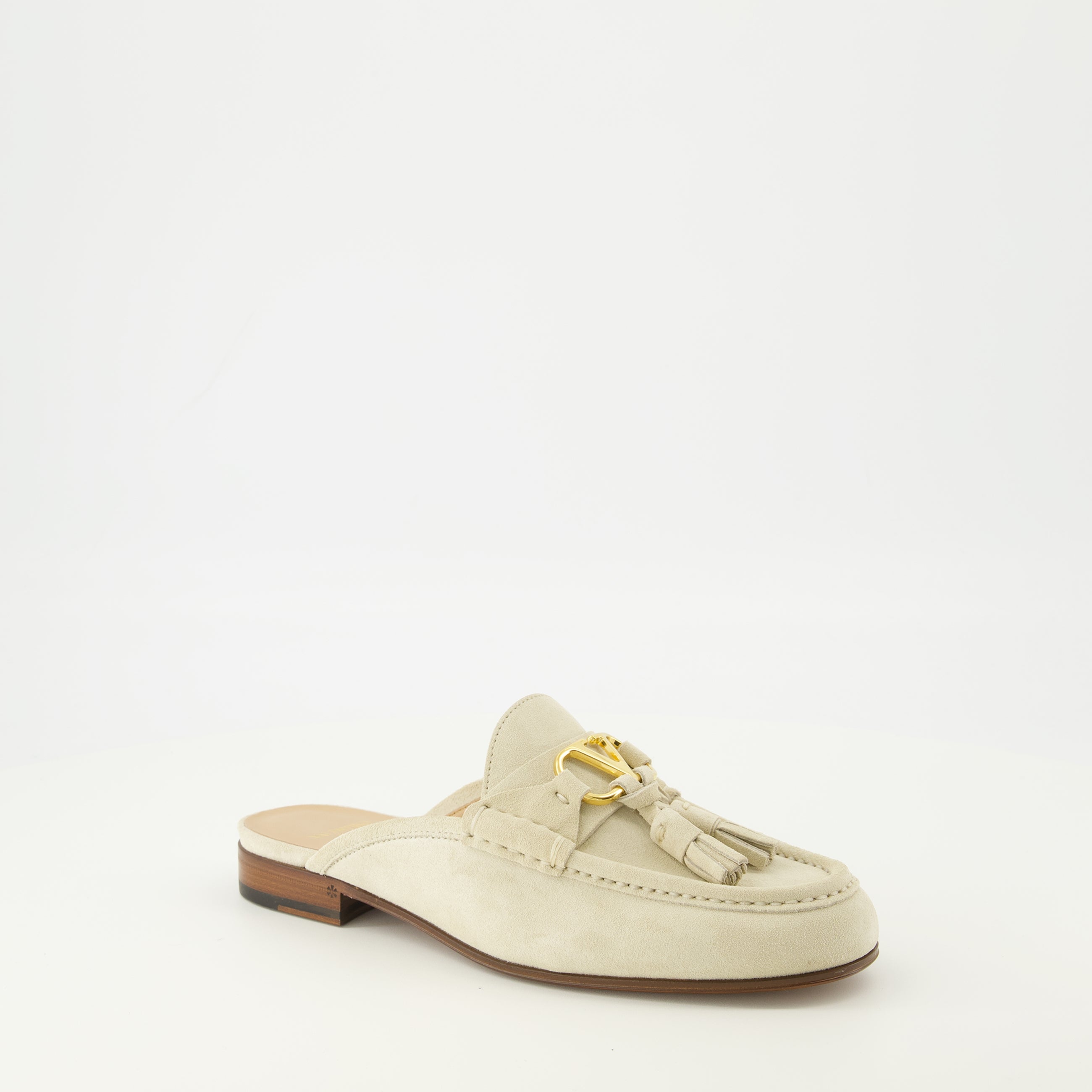 Image of the beige leather mules by Valentino Garavani for Women - Spring-Summer 2026 - Three-quarter front right view