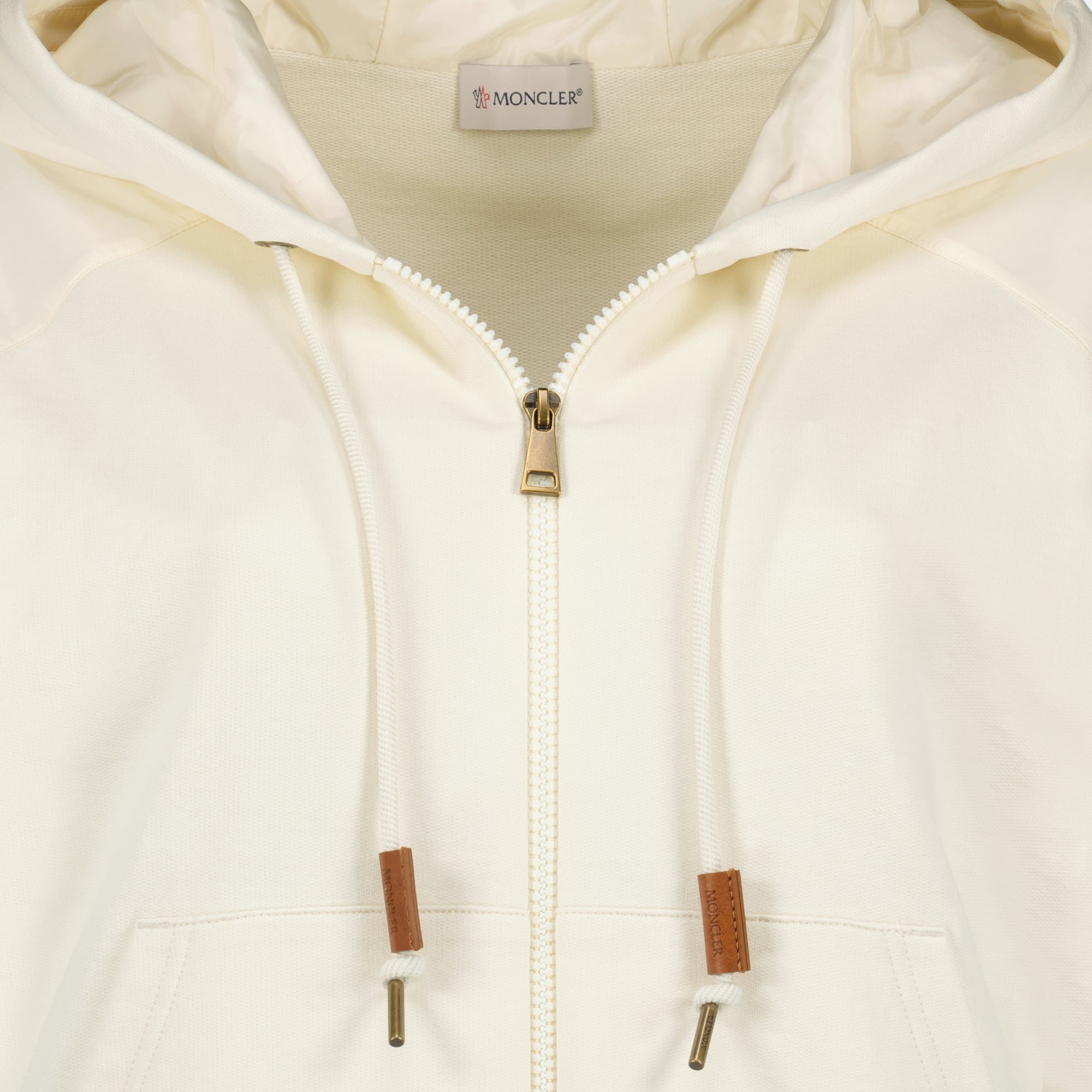 Image of the item Beige short-sleeved zip jacket by Moncler for Women - Spring-Summer 2026 - Detailed View_2