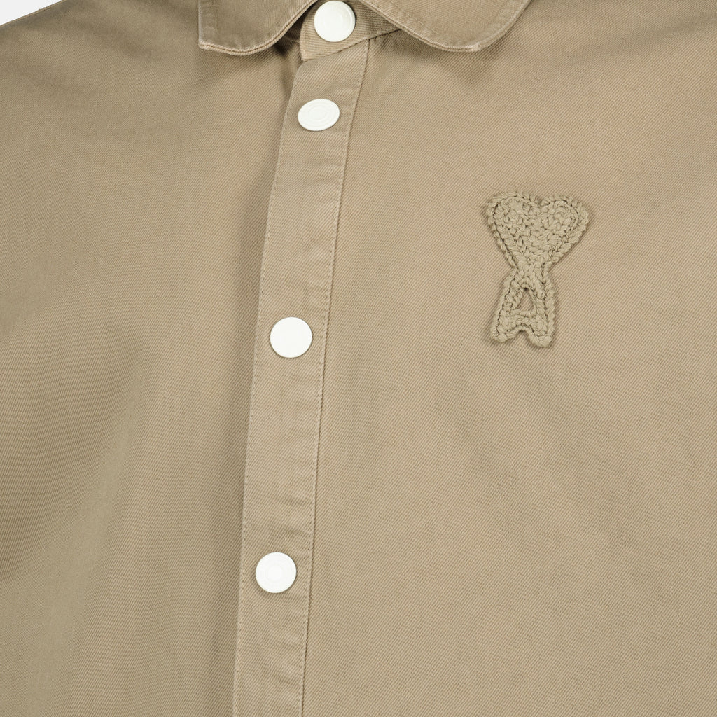 Immagine dell'articolo Camicia overshirt beige in cotone del marchio Ami PARIS per Unisex - Stagione Primavera-Estate 2026 - Vista dettagliata_1