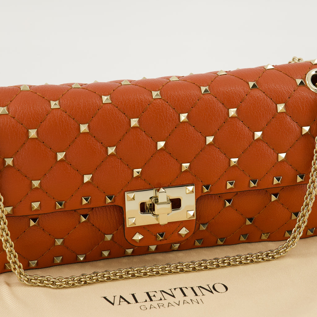 Sacs à main et épaule Sac Rockstud Spike orange Valentino Garavani Orange Femme