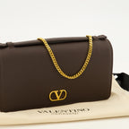 Petite maroquinerie VLogo Kettenbörse aus braunem Leder Valentino Garavani Marron Femme