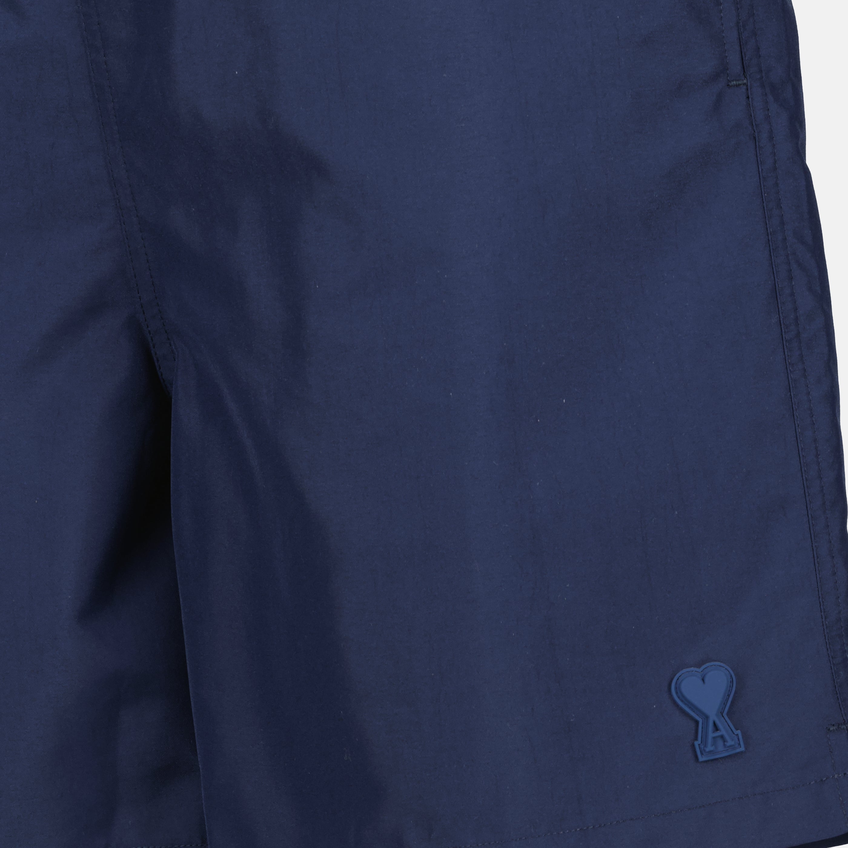 Image de l'article Maillot de bain bleu marine de la marque Ami PARIS pour Homme - Saison Printemps-Été 2026 - Vue détaillée_1