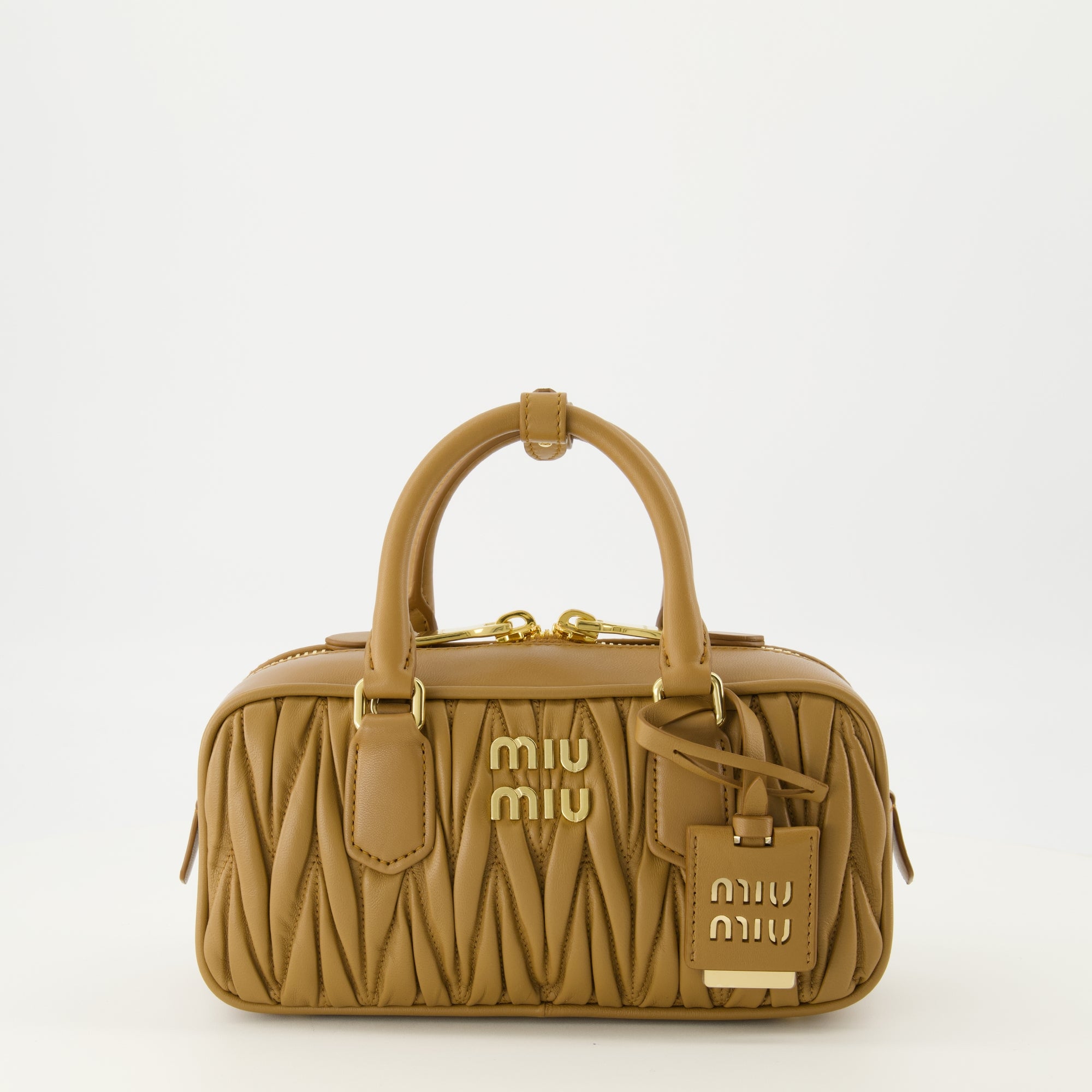 Image of the article Acardie quilted brown bag by the brand Miu Miu for Women - Spring-Summer Season 2026 - Front View