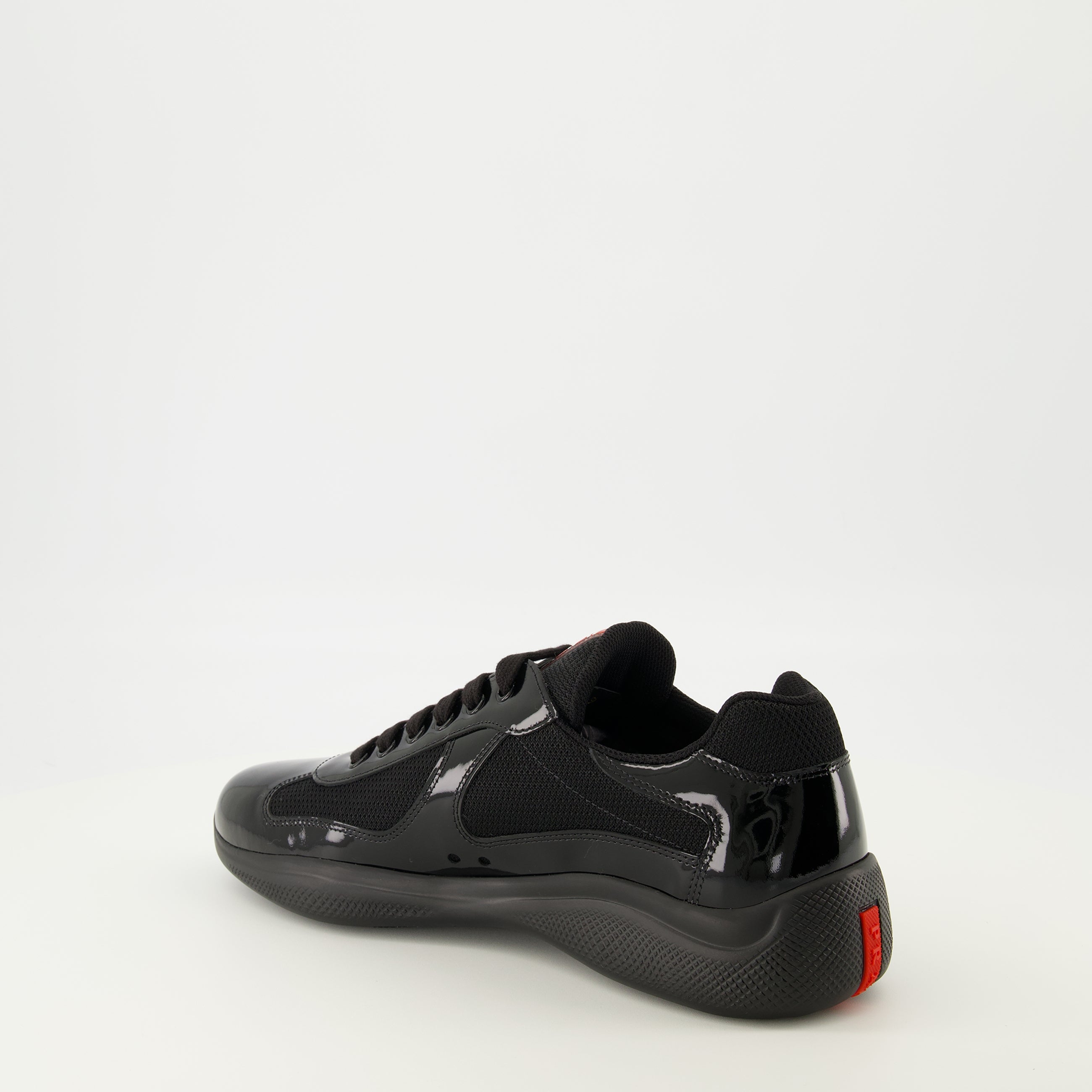 Image de l'article Baskets Prada America's cup noir de la marque Prada pour Homme - Saison Printemps-Été 2026 - Vue trois quarts arrière droite