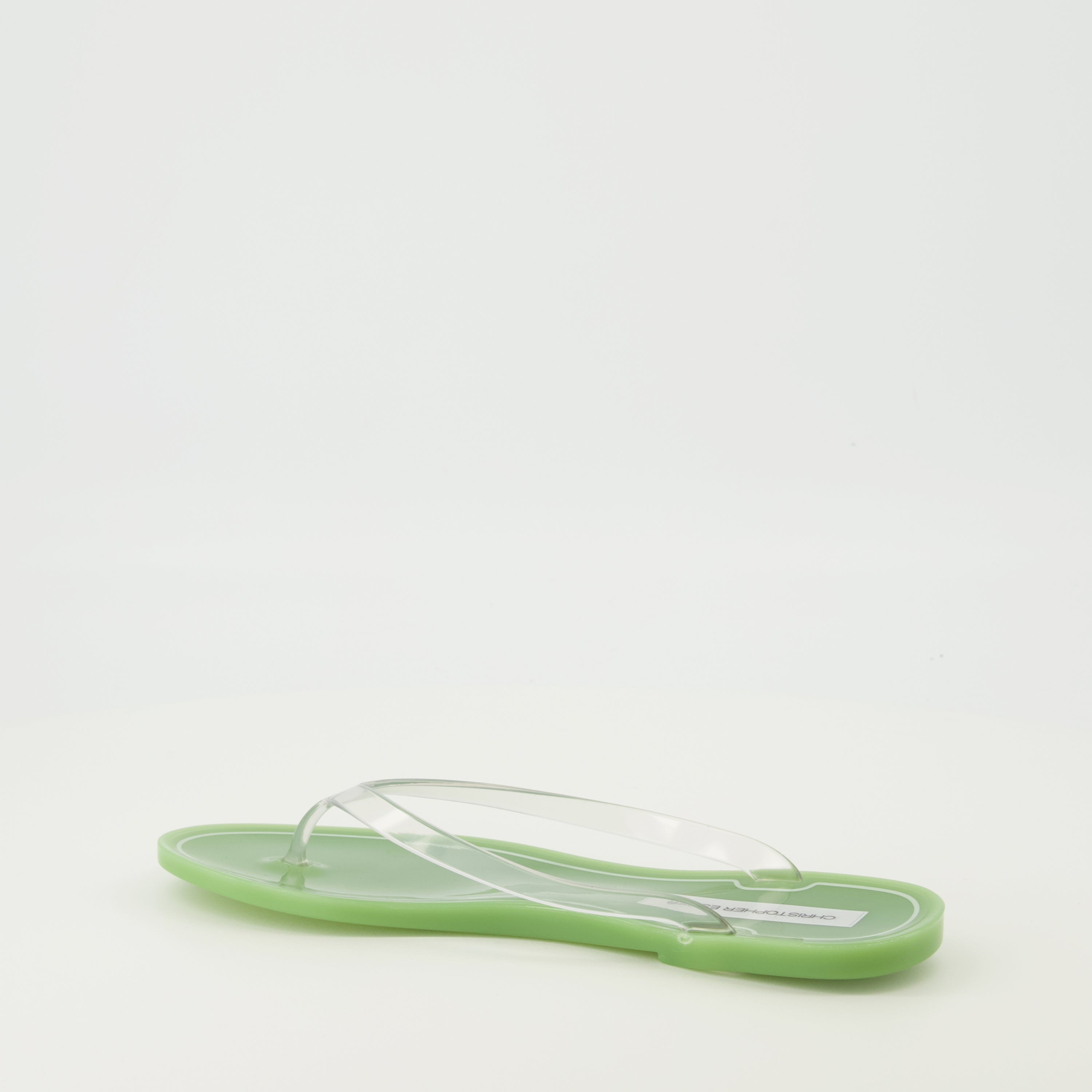 Image de l'article Tongs Jo en PVC vert de la marque Christopher Esber pour Femme - Saison Printemps-Été 2026 - Vue trois quarts arrière droite