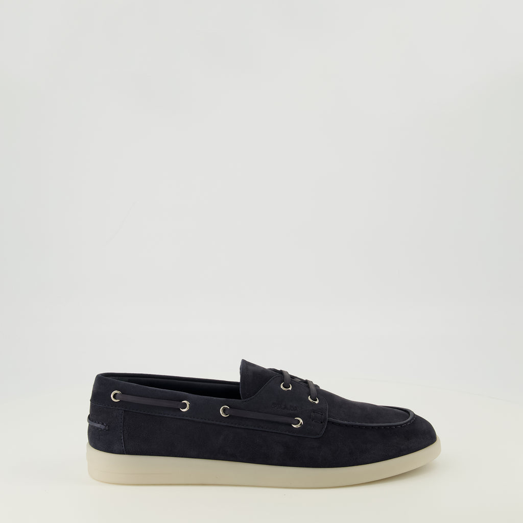 Image of the navy blue suede loafers from the Prada brand for men - Spring-Summer 2026 season - Right side view