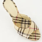 Chaussures ouvertes Mules à carreaux Burberry Beige Femme