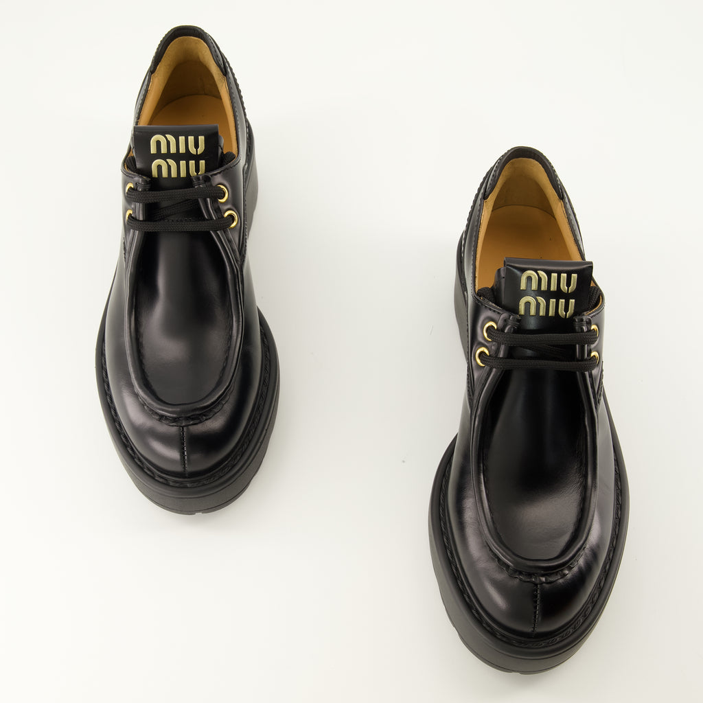 Chaussures plates 블랙 가죽 시티 슈즈 Miu Miu Noir Femme