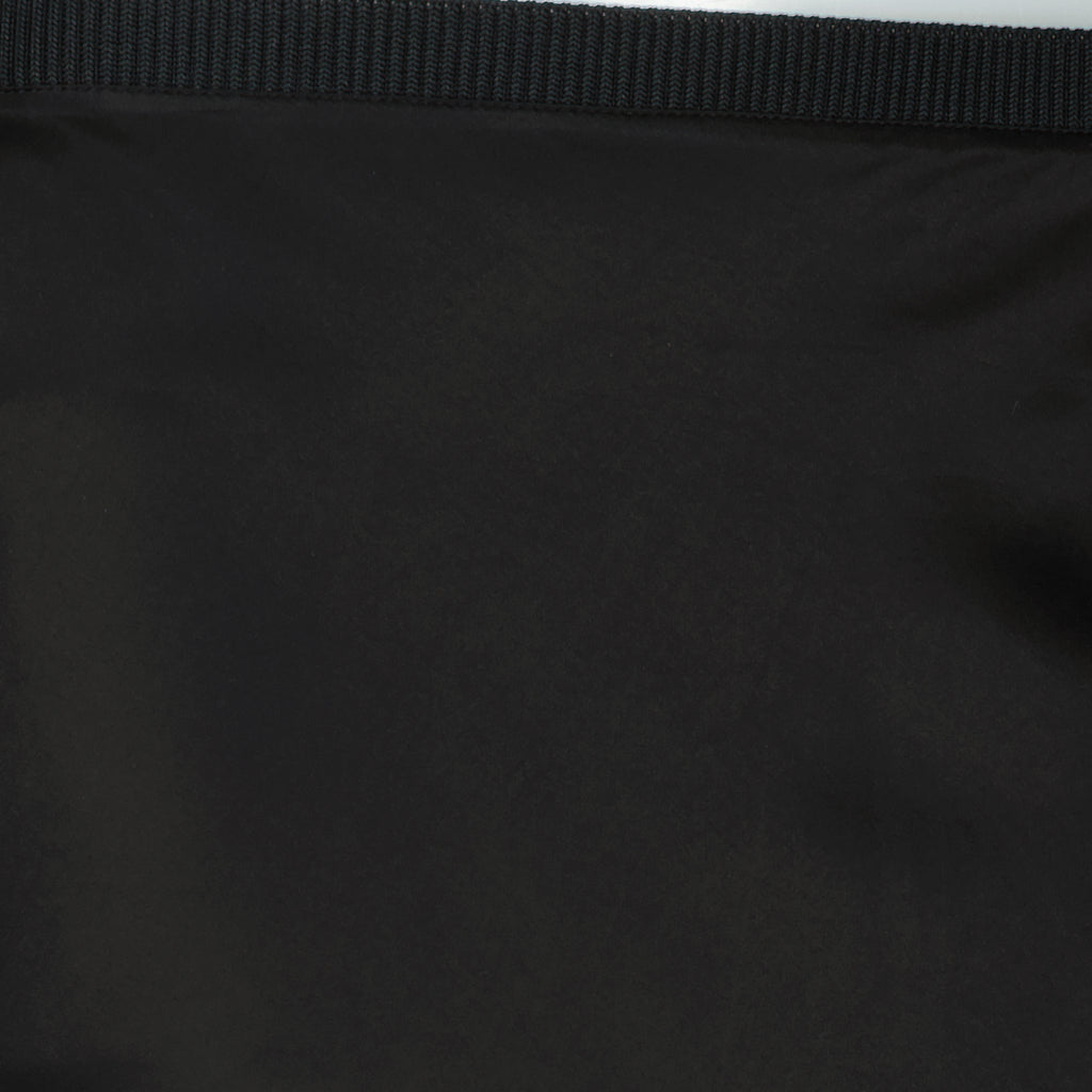 Image de l'article Jupe midi noir effet satiné de la marque Ami PARIS pour Femme - Saison Printemps-Été 2026 - Vue détaillée_1