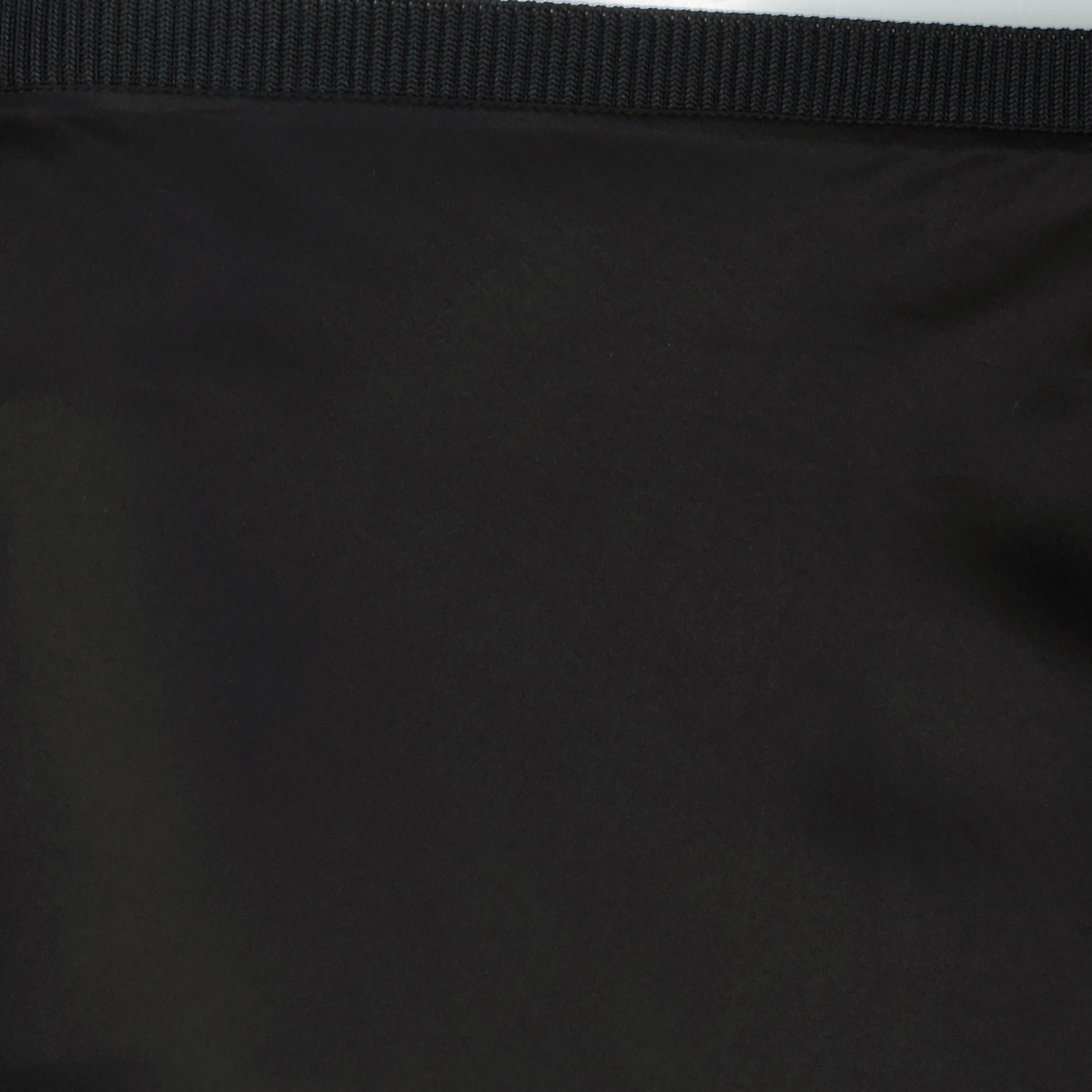 Image de l'article Jupe midi noir effet satiné de la marque Ami PARIS pour Femme - Saison Printemps-Été 2026 - Vue détaillée_1