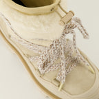 Image of the Moncler Peak suede and shearling boots for Women - Fall-Winter 2025 season - Detailed top view