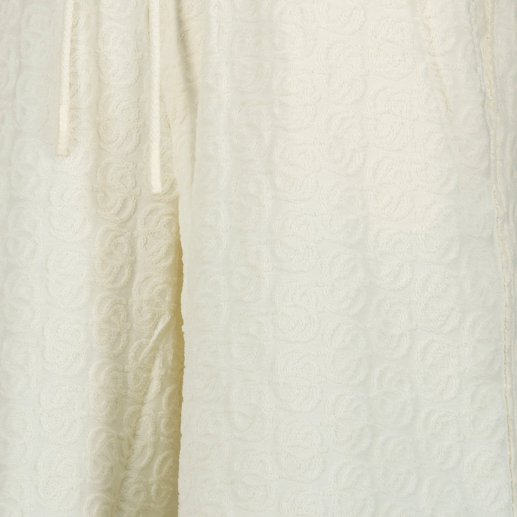 Imagem do short monograma branco da marca Drole De Monsieur para Homem - Temporada Primavera-Verão 2026 - Vista Detalhada 1