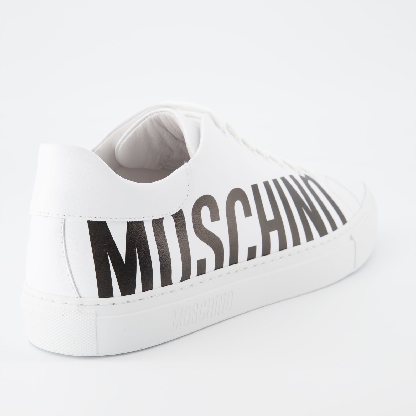 Sneaker Baskets à logo Moschino Weiß Homme